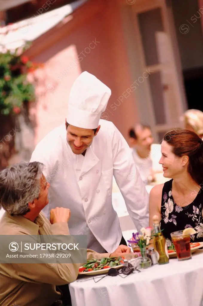 Chef talking to patron