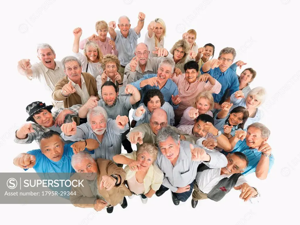 A group of people pointing up