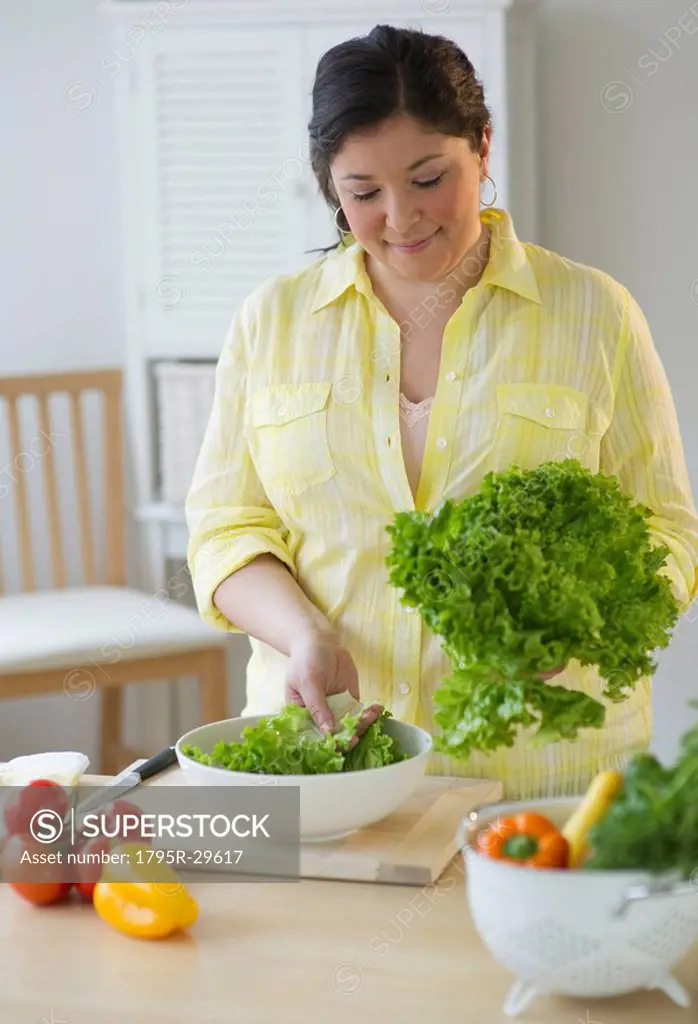 Woman preparing a salad