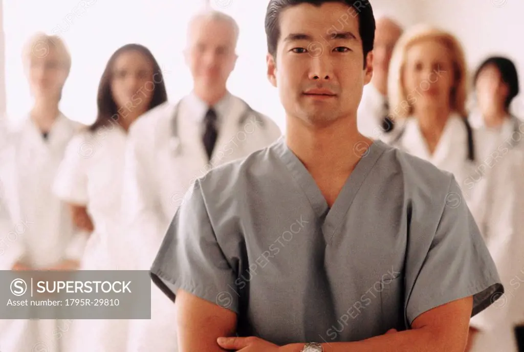 Doctor standing in front of medical team