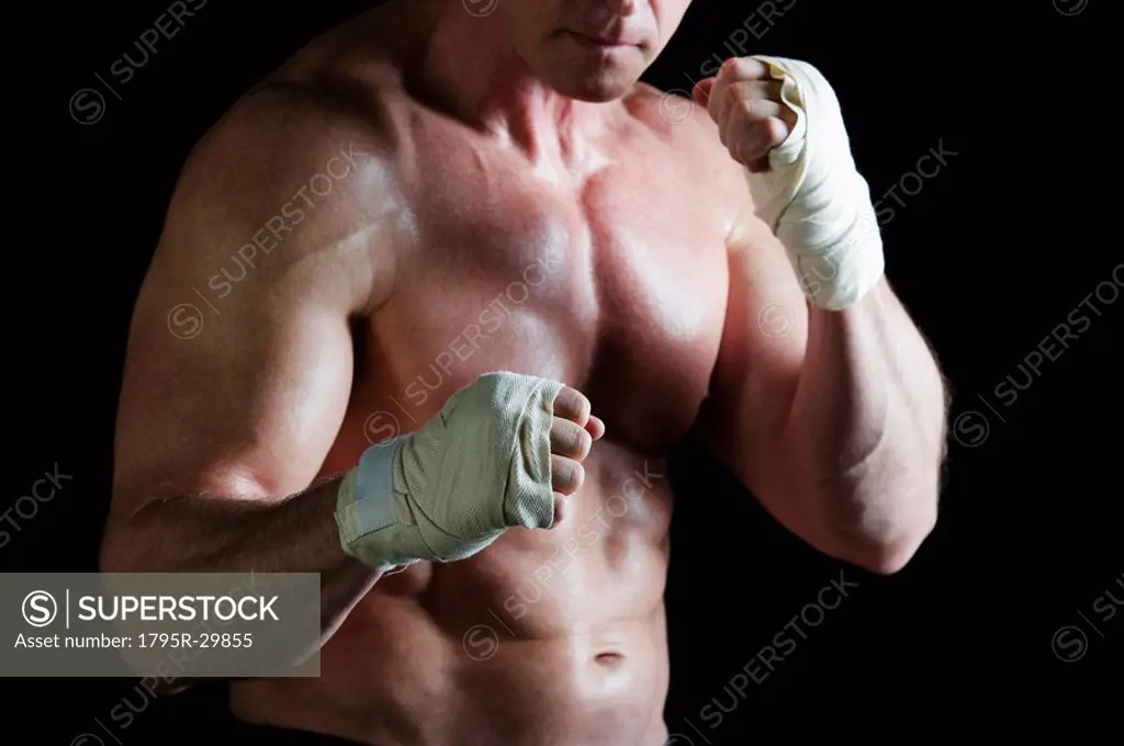Boxer with taped hands