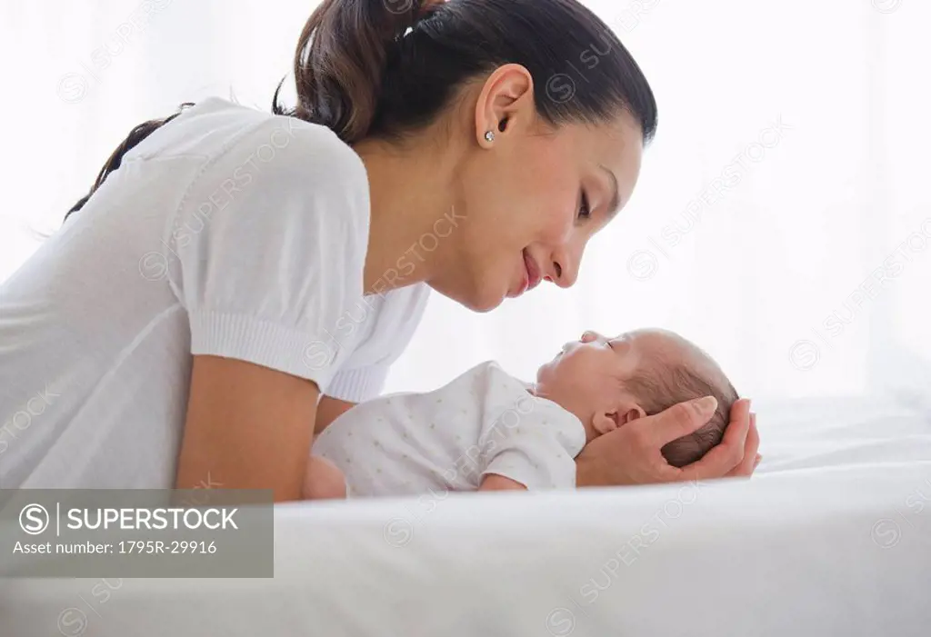 Mother sharing a tender moment with her baby