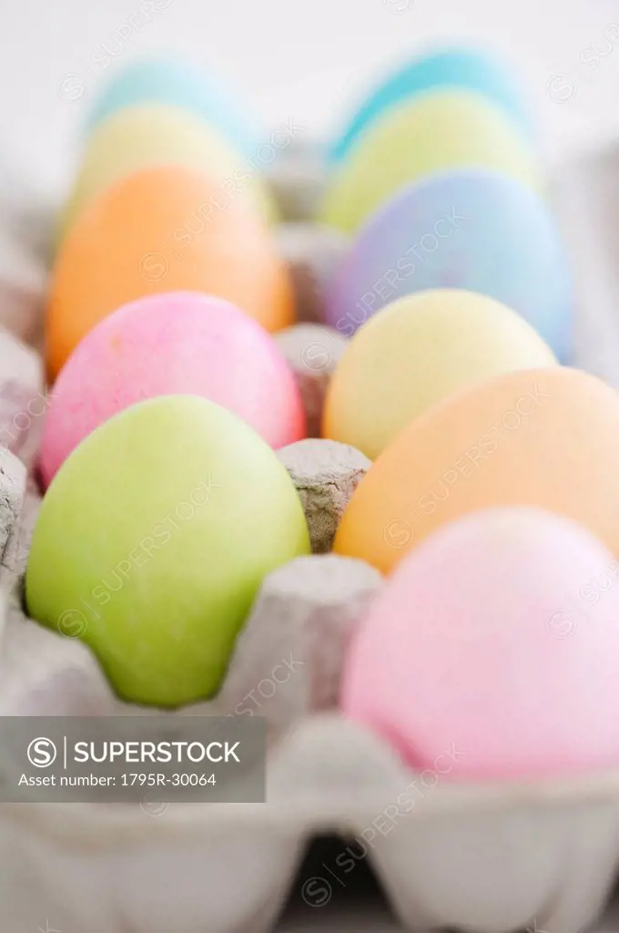 Dyed Easter eggs in carton