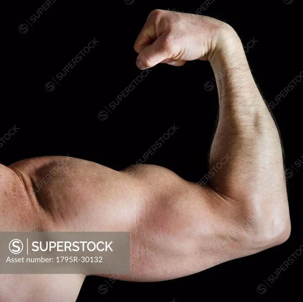 Muscular man flexing his bicep