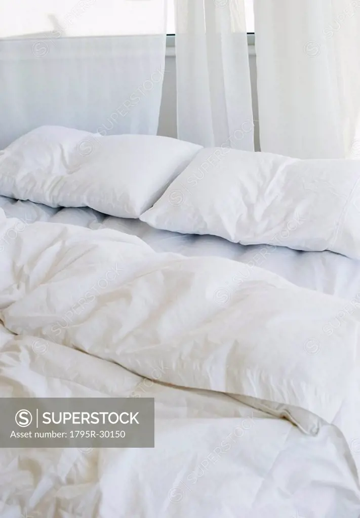 Bed with white linens