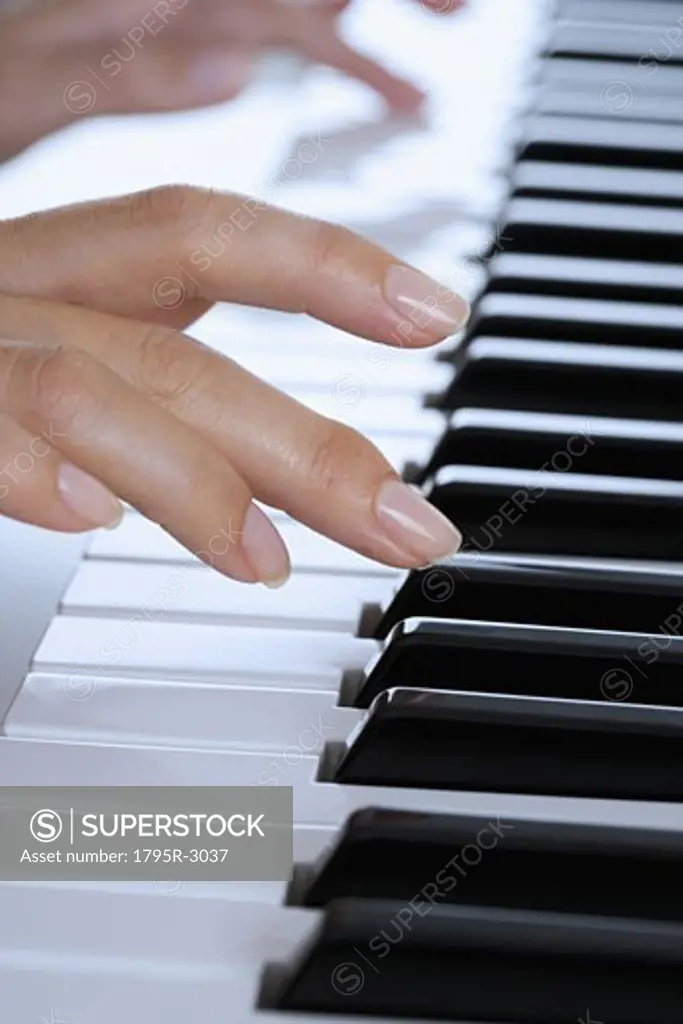 Fingers playing piano