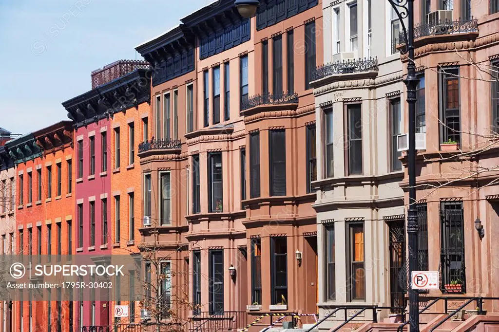 Row of brownstone townhouses