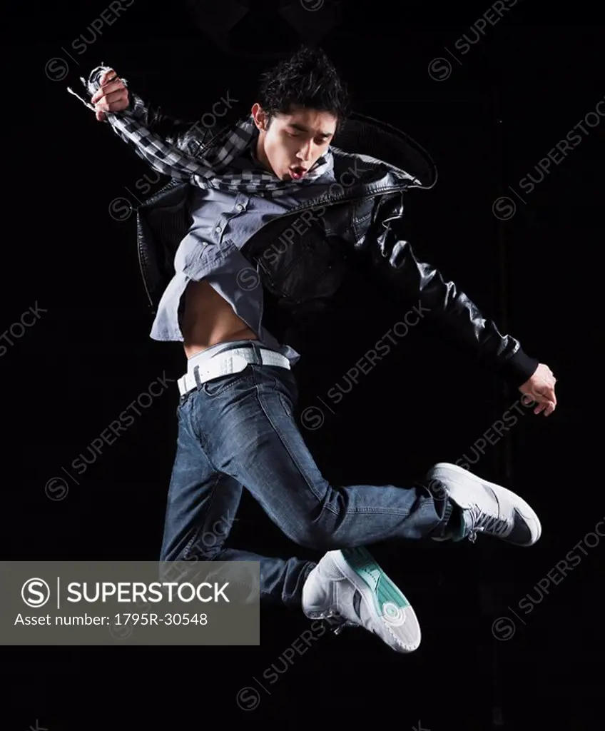 Hip hop dancer jumping in the air