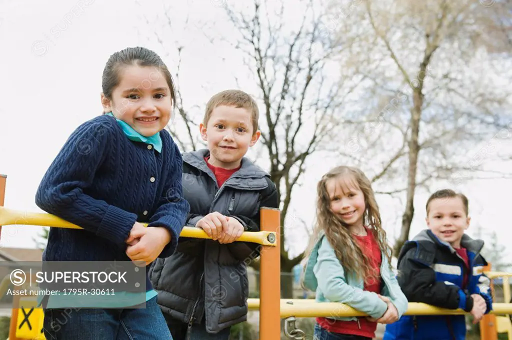 Elementary school students playing in playground at recess