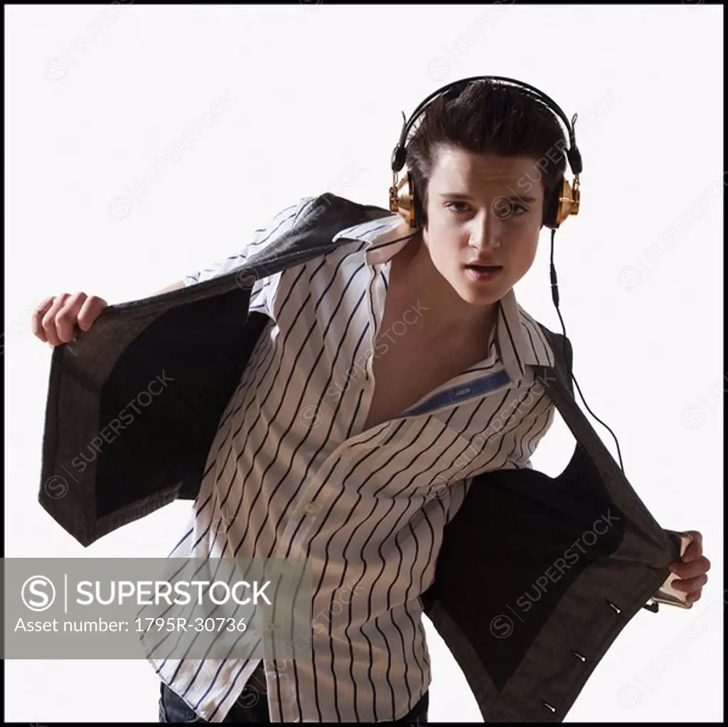 Male dancer listening to music on mp3 player