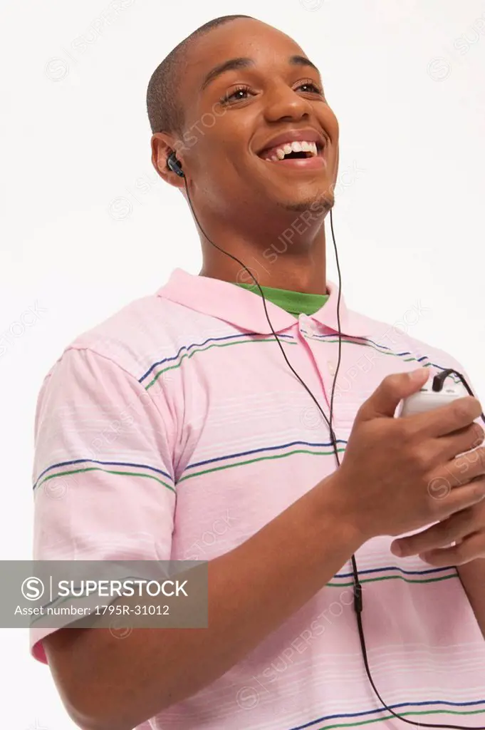 Laughing man wearing earphones