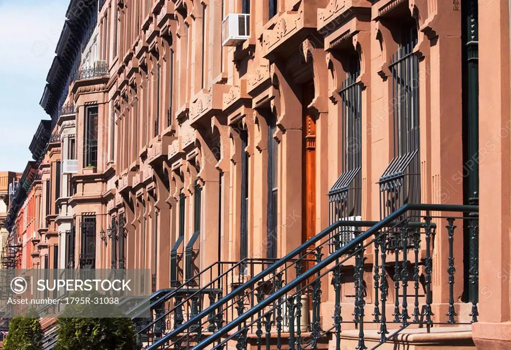 Row of brownstone townhouses