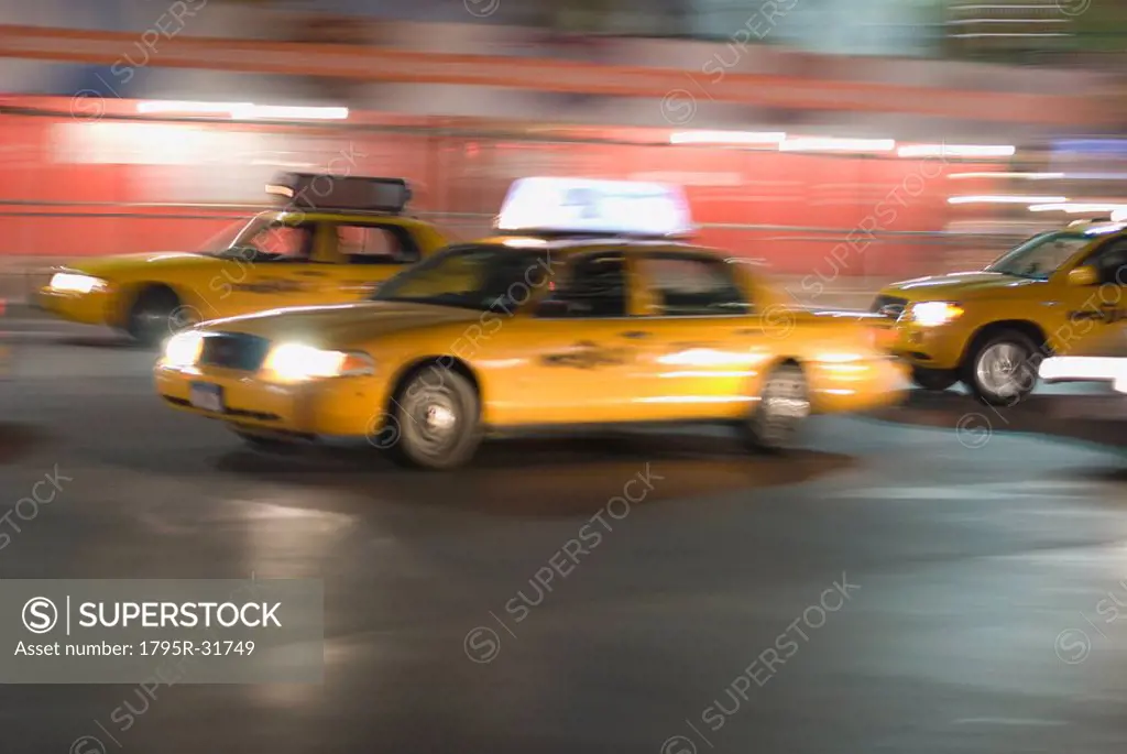 Taxi cabs driving