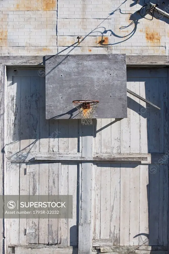 Basketball net on rustic building