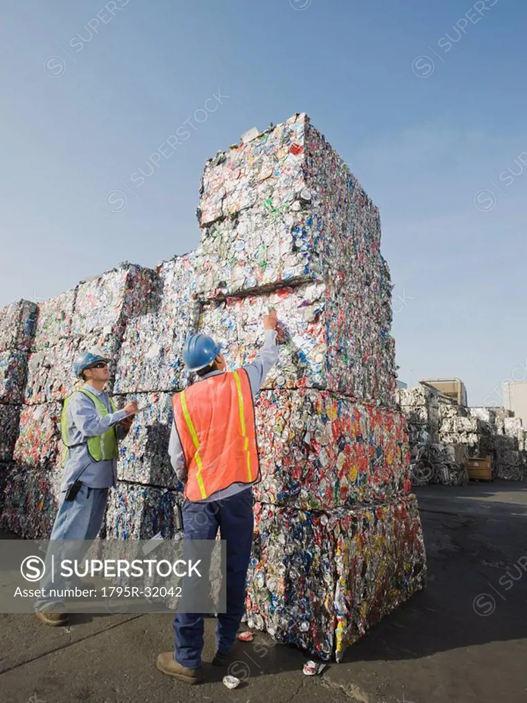 Workers at recycling plant