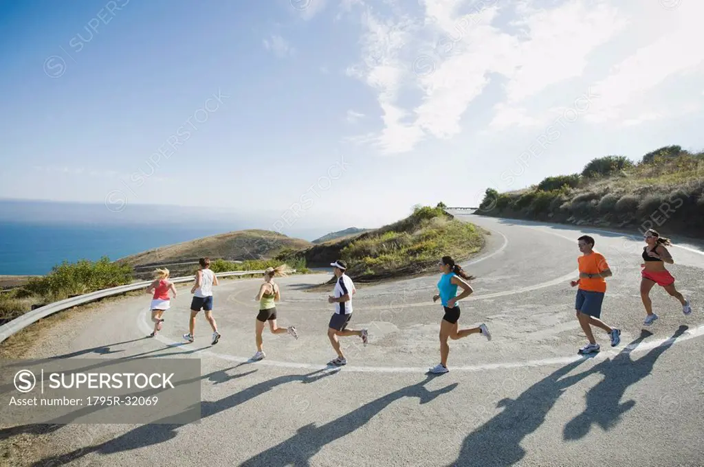 Runners on a road in Malibu