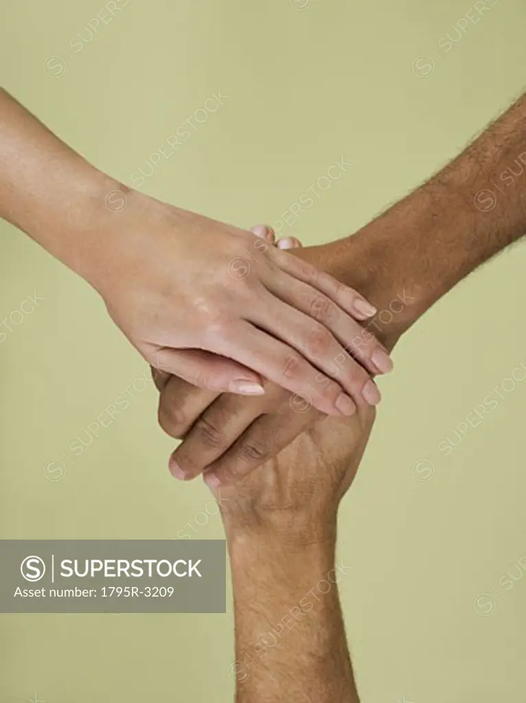 Holding hands in multiracial group