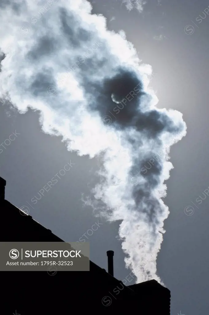 Smoke coming out of factory chimney