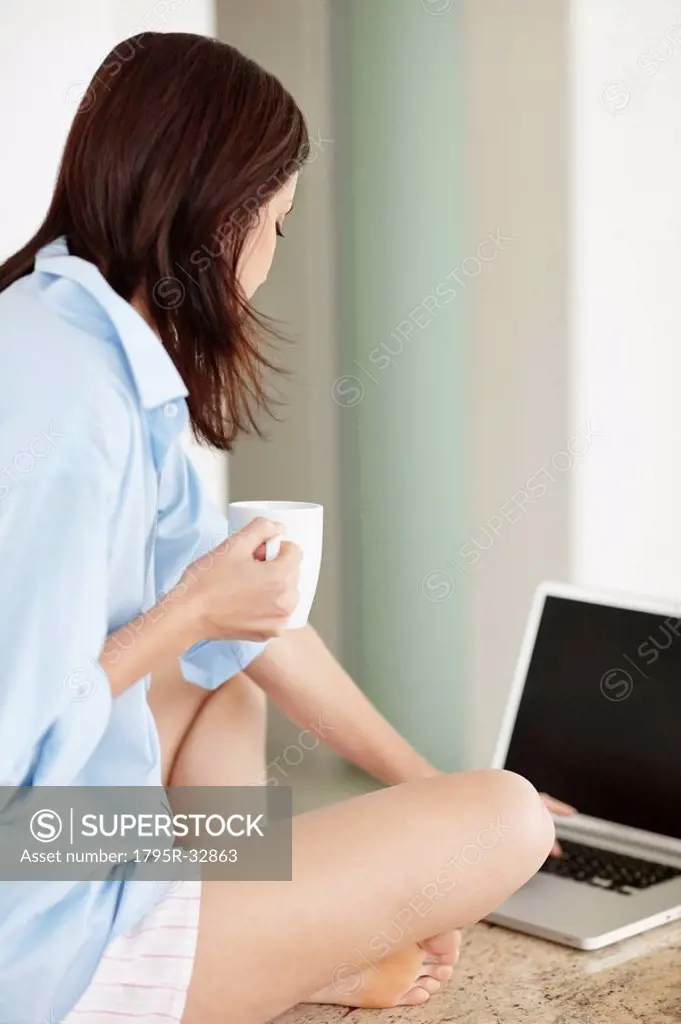 Brunette woman browsing the internet