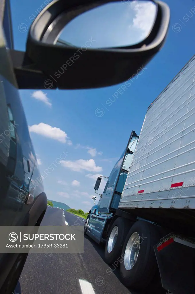 Truck and car on highway
