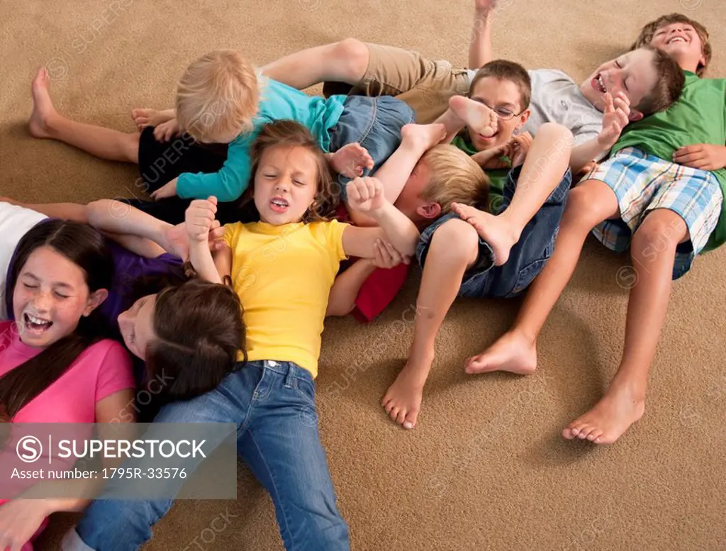 Group of children playing on floor