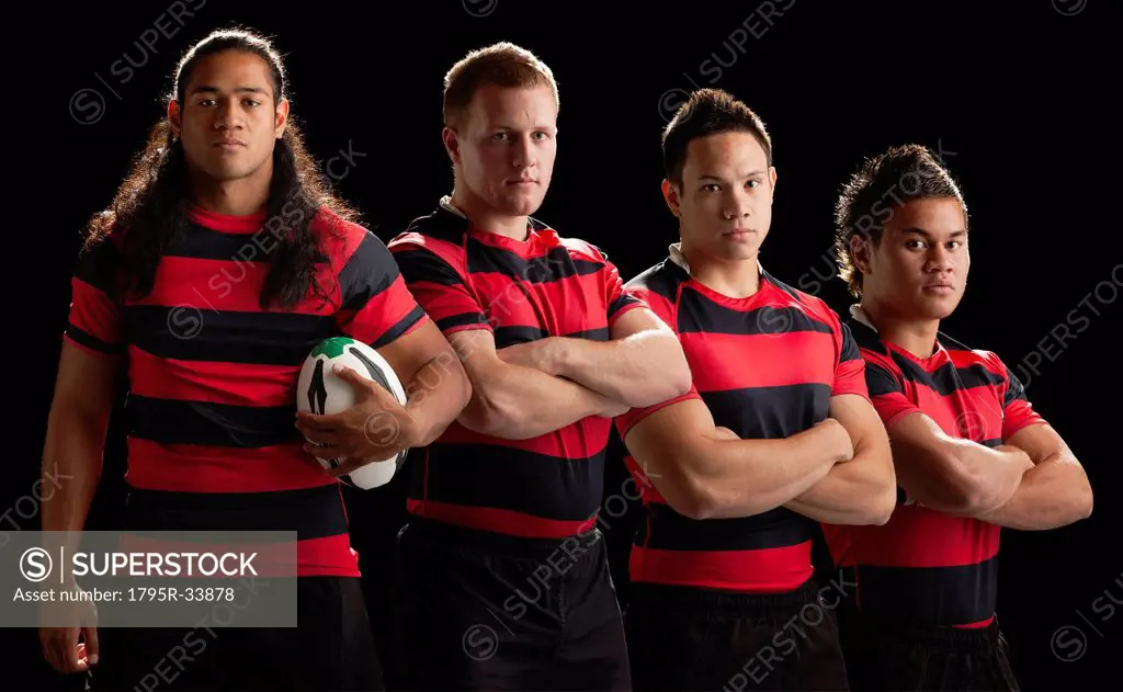 Studio portrait of male rugby team