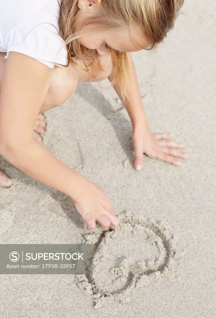 Girl 10_11 playing on beach