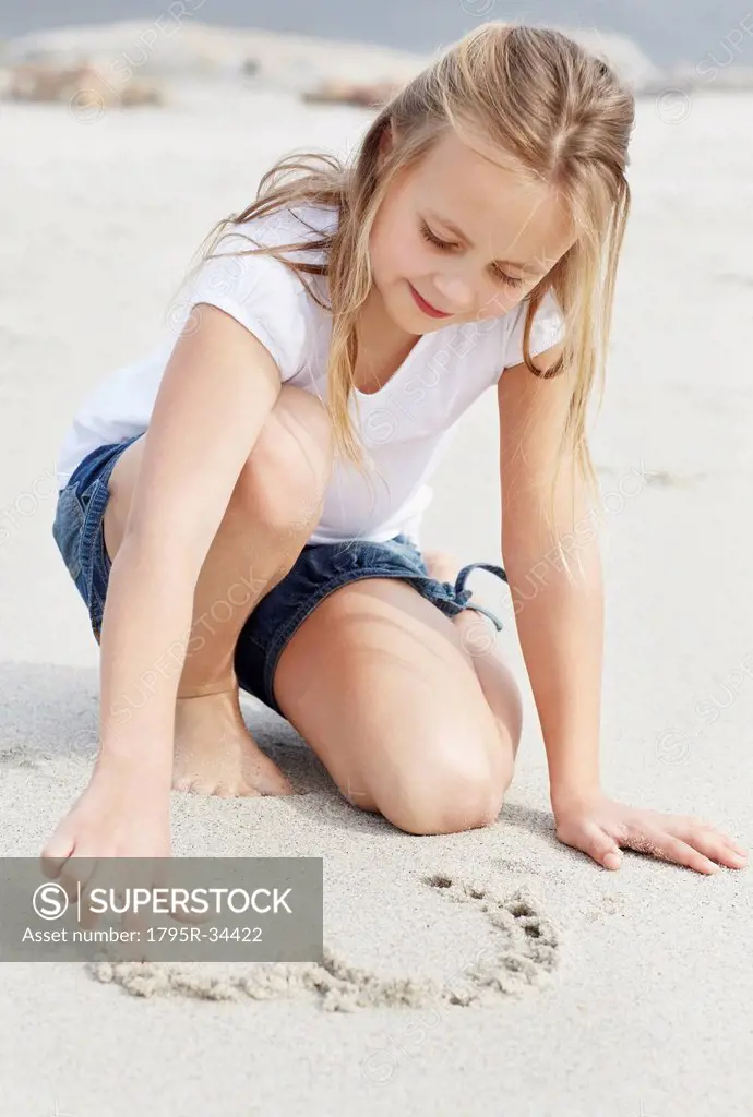 Girl 10_11 playing on beach