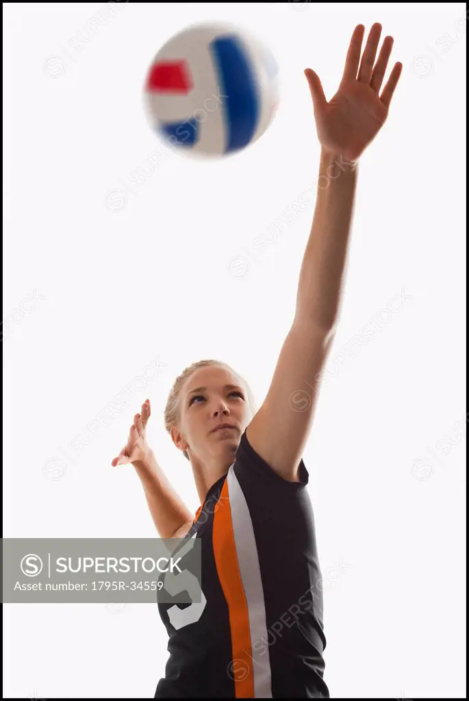Young girl 16_17 playing volleyball
