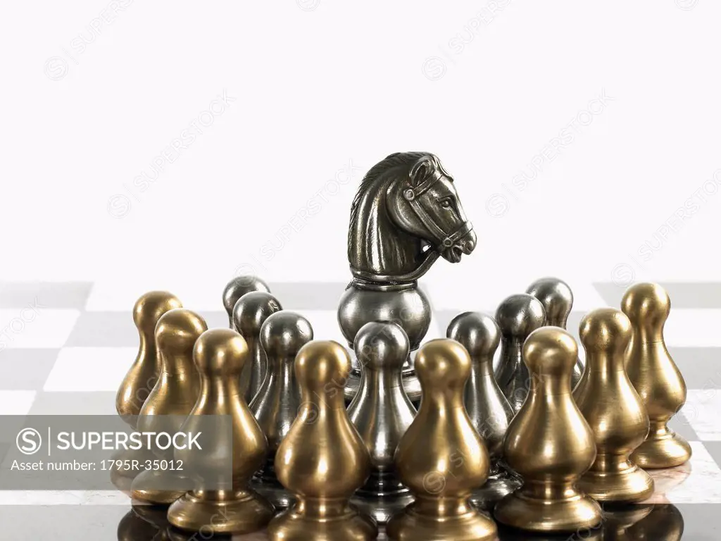 Knight surrounded by pawn chess pieces