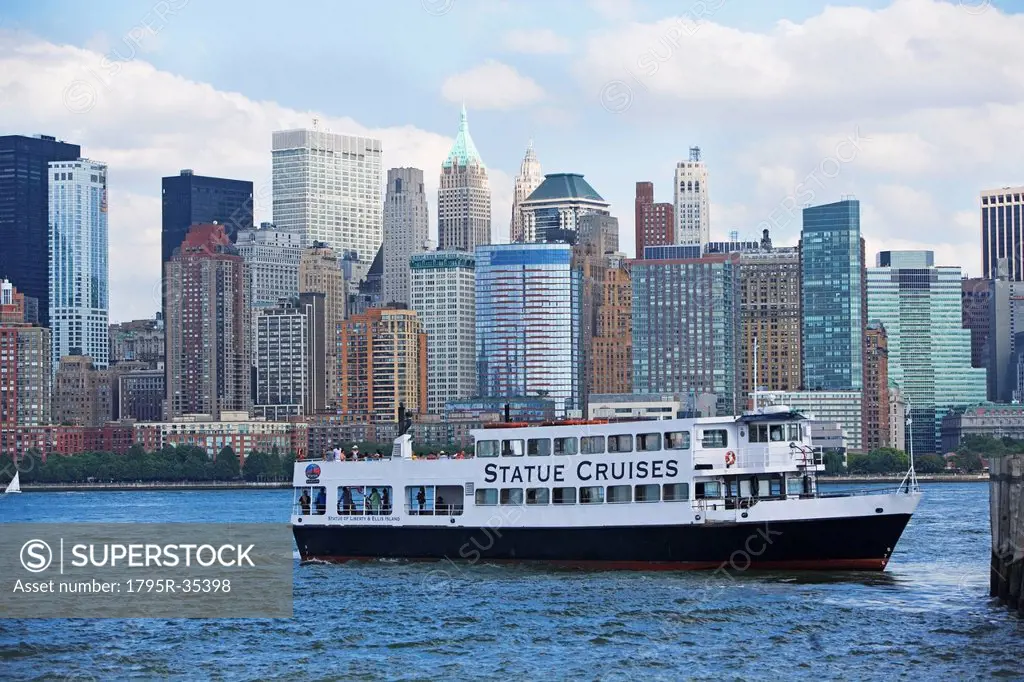 USA, New York State, New York City, Cruise ship on Hudson River, Battery Park in background
