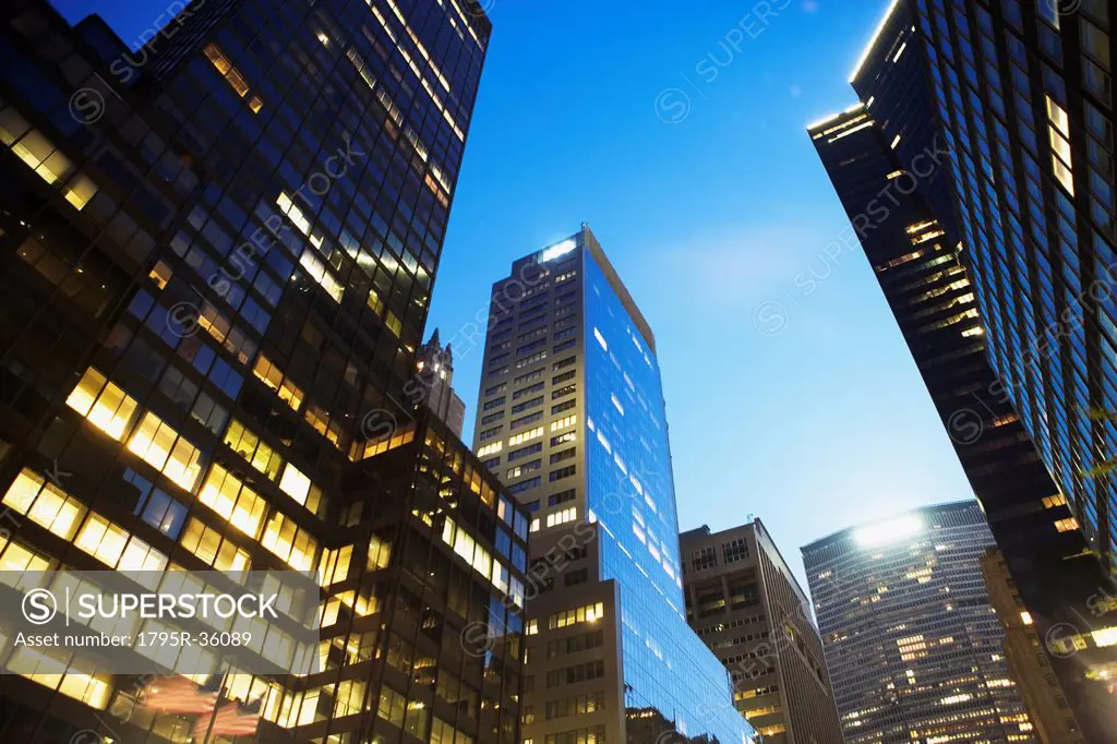 USA, New York State, New York City, Low angle view of skyscrapers at twilight