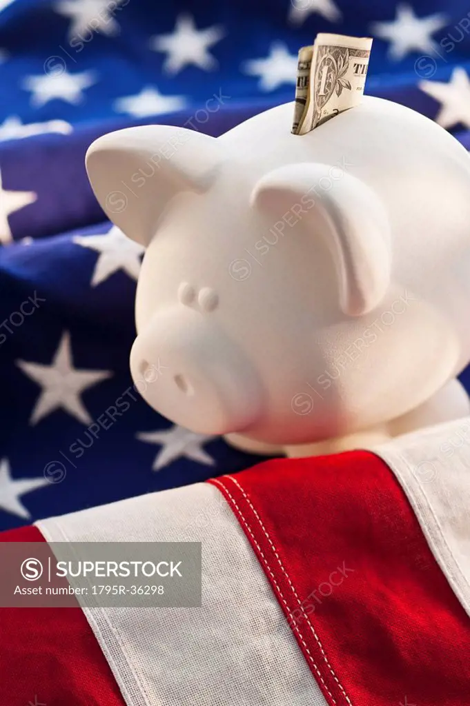 Piggybank on top of American flag