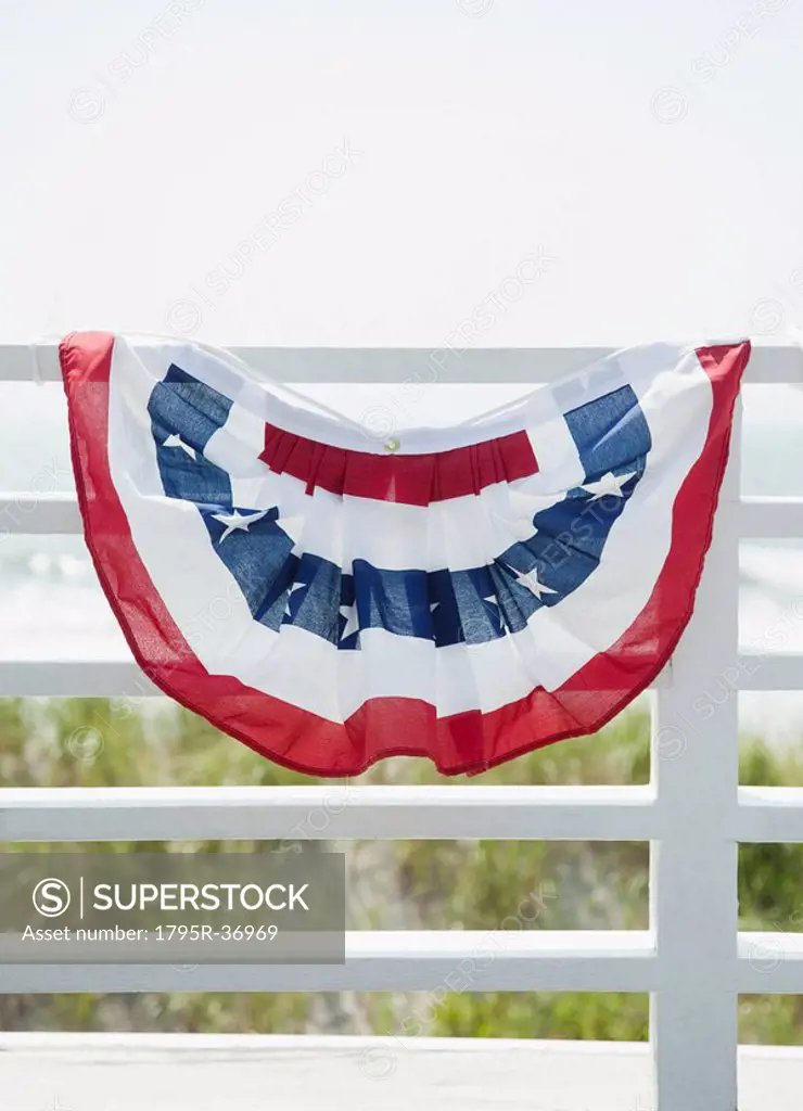 American flag decoration on fence