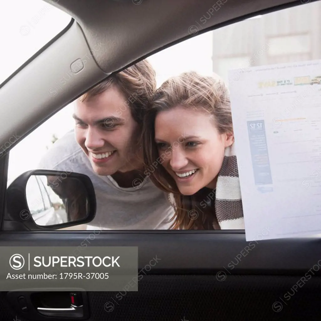 Couple shopping for new car