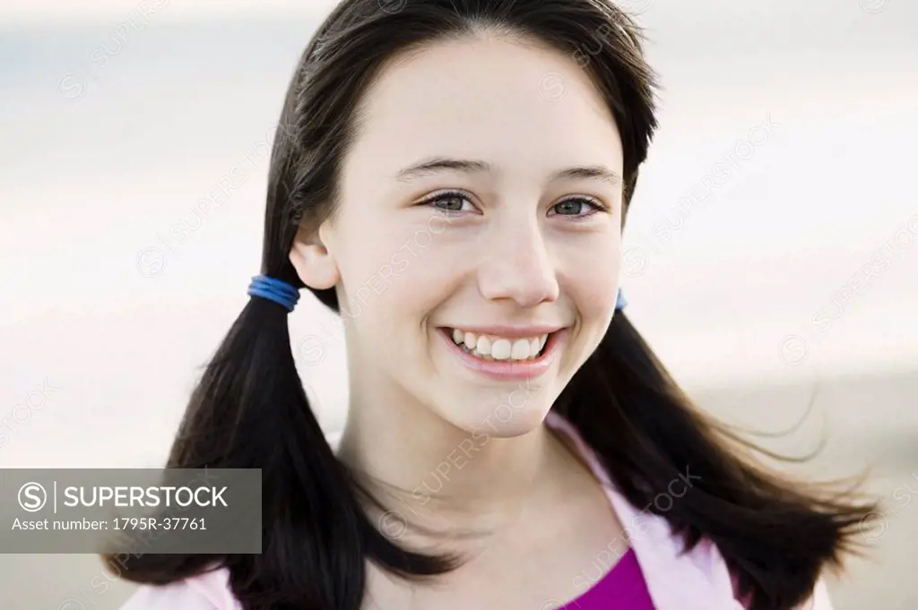 Young girl with pony tails