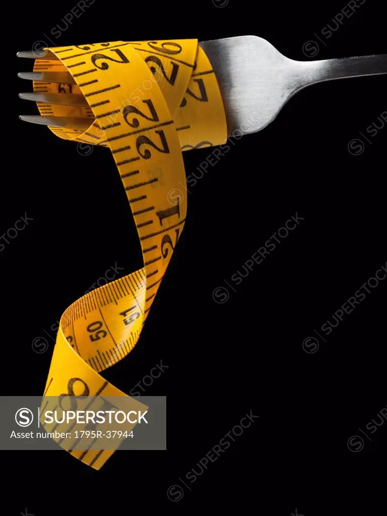 Measuring tape around fork