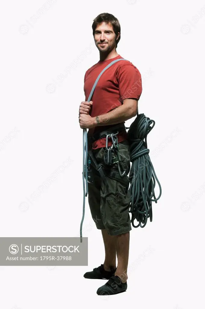 Portrait of man with climbing gear
