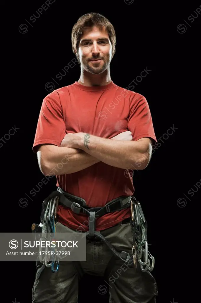 Portrait of male climber wearing harness