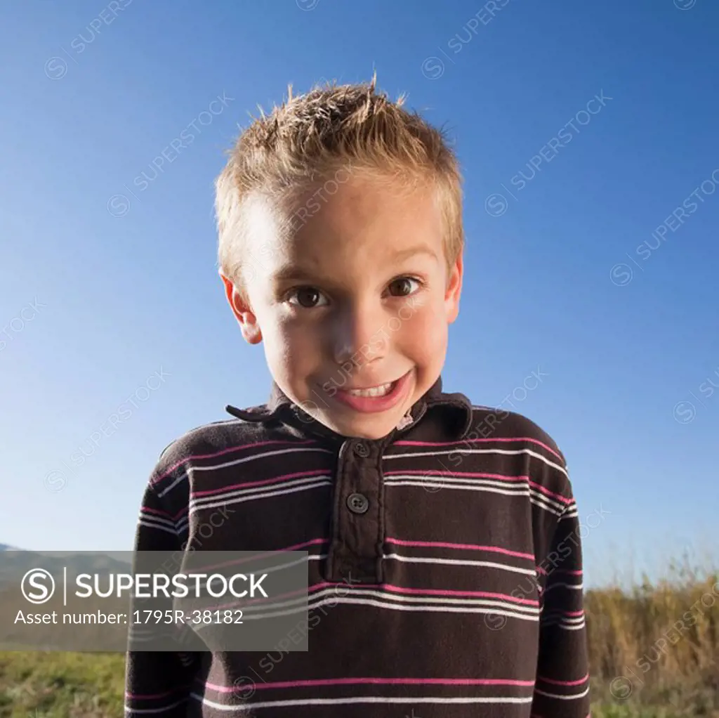 Young boy with goofy expression