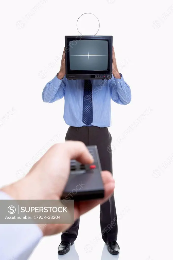 Man holding television and remote