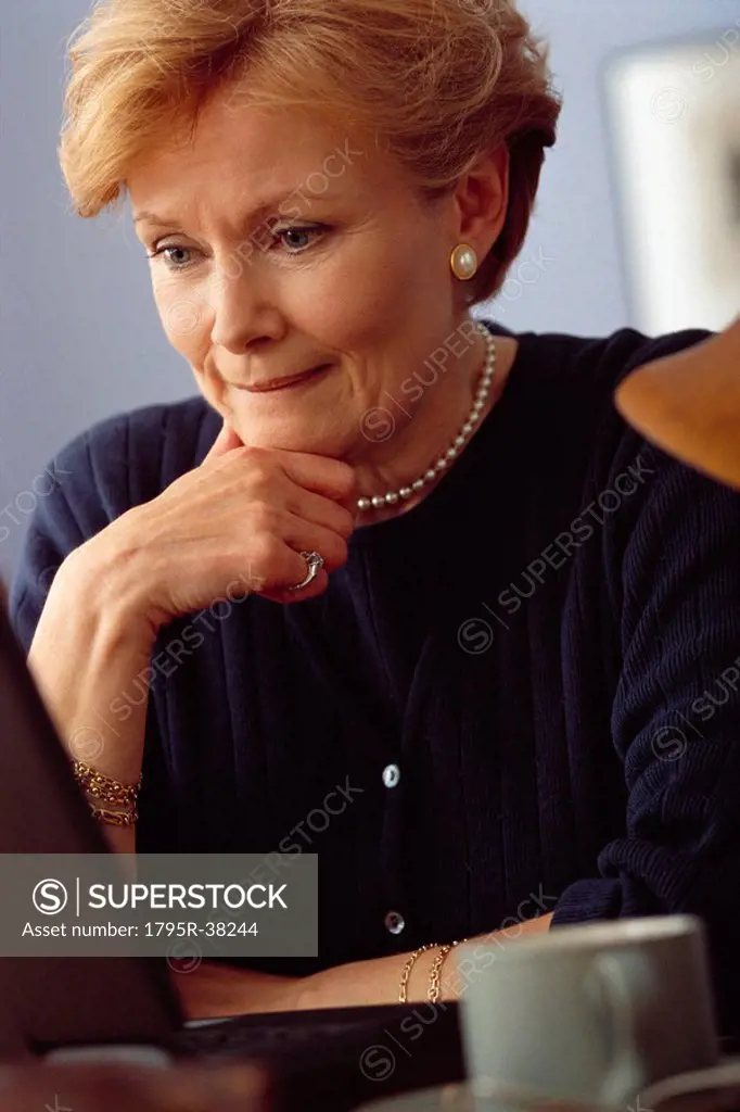 Senior woman working on computer