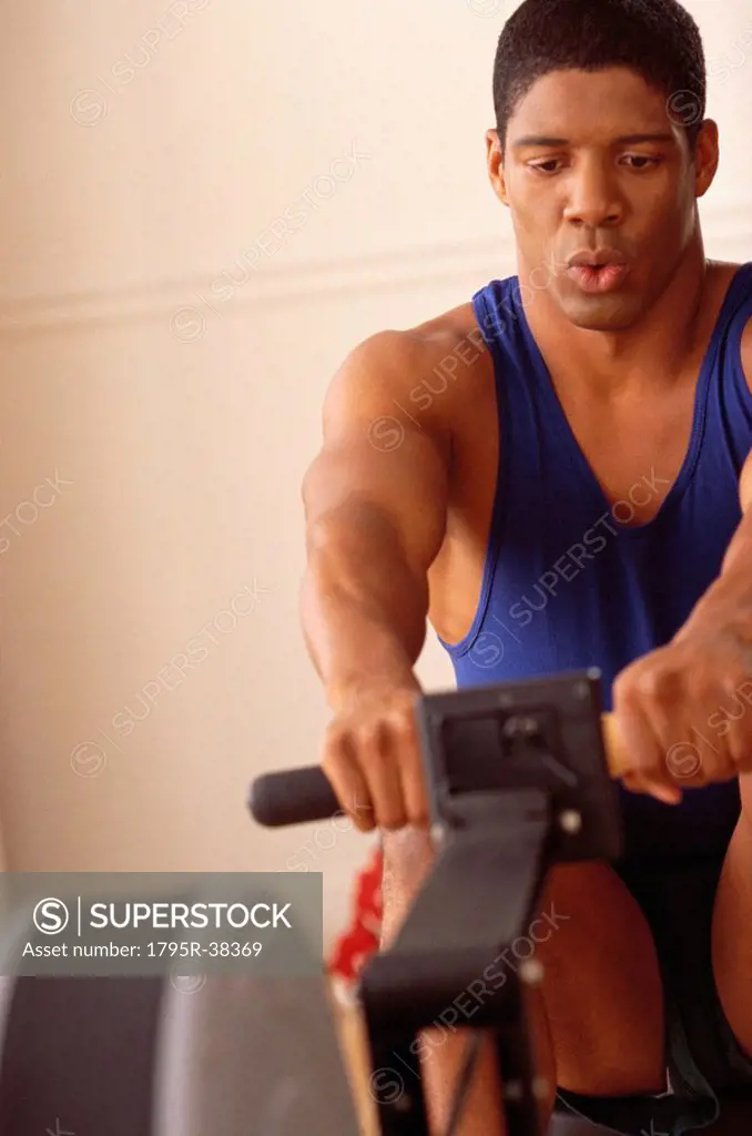 Man on exercise machine
