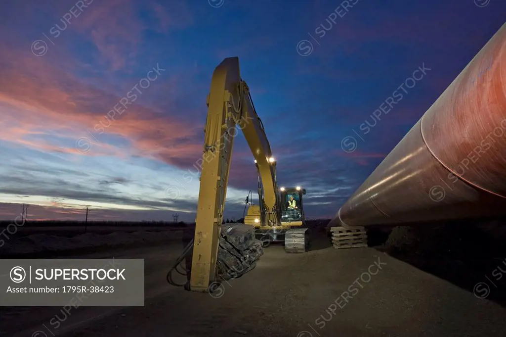 Heavy equipment beside pipeline