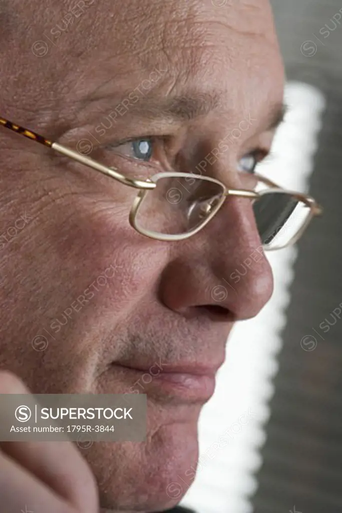 Portrait of man with glasses