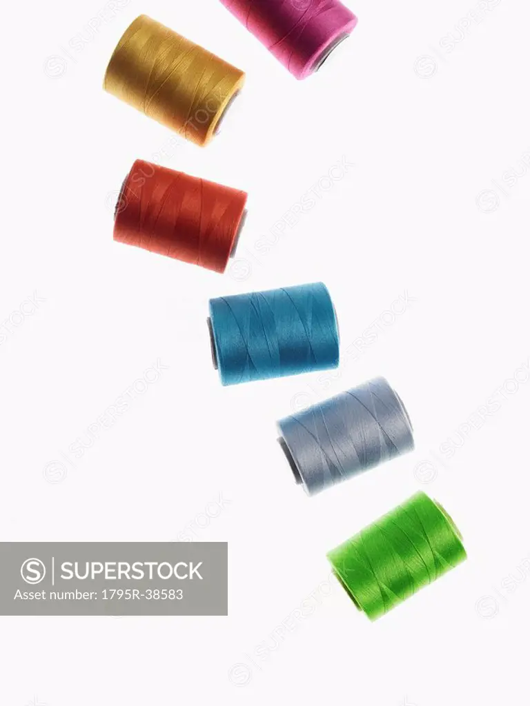 Colored spools of thread