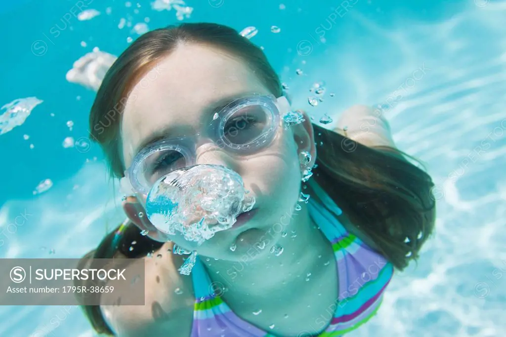 A young girl in a swimming pool