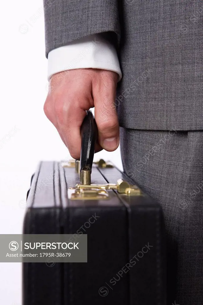 A businessman holding a briefcase