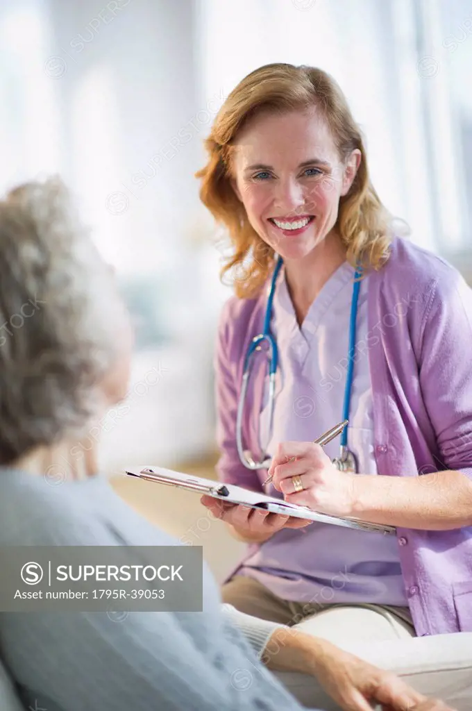 USA, New Jersey, Jersey City, Female nurse with patient
