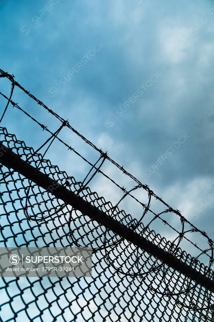 USA, New York, New York City, Barbed wire fence